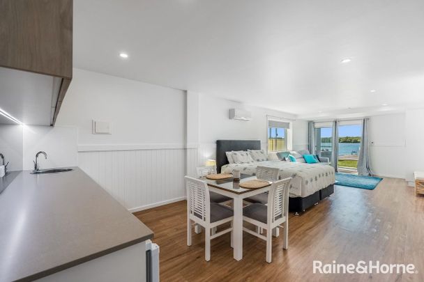 Fully Furnished Riverside Living - Photo 1