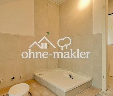 Exklusive Dachgeschosswohnung – Fußbodenheizung, Designglas, EBK & ... - Photo 5