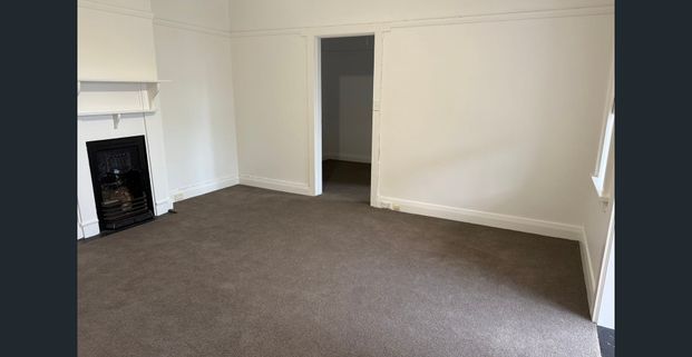 Oversized Top-Floor 2-Bedroom Unit with Sunroom & Park Views - Photo 1