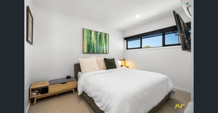 Stylish Fully Furnished Home in a Prime Location - Photo 2