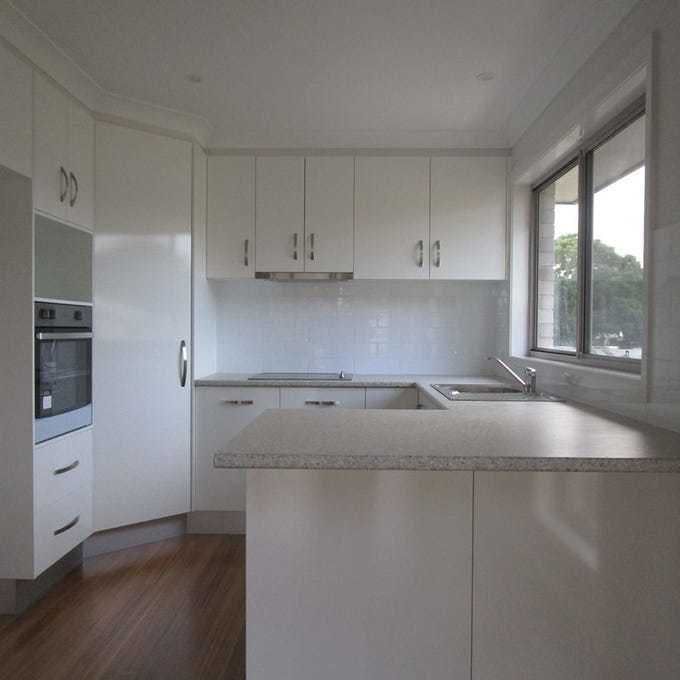 Stylish Four-Bedroom Home with Contemporary Features - Photo 1