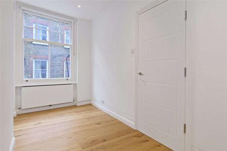 Set on the first floor of a popular mansion block in Bloomsbury, we offer this recently refurbished two bedroom apartment. - Photo 4