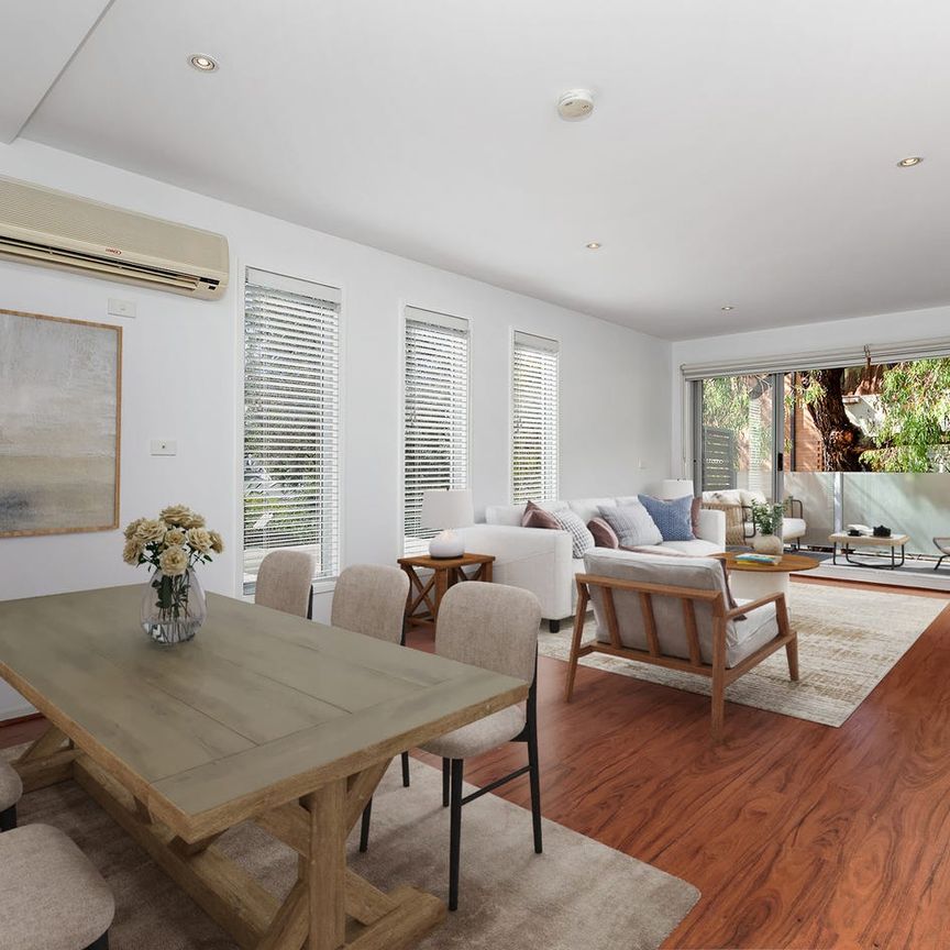 Two Floors, Two Carports, Too Good to Miss! - Photo 1