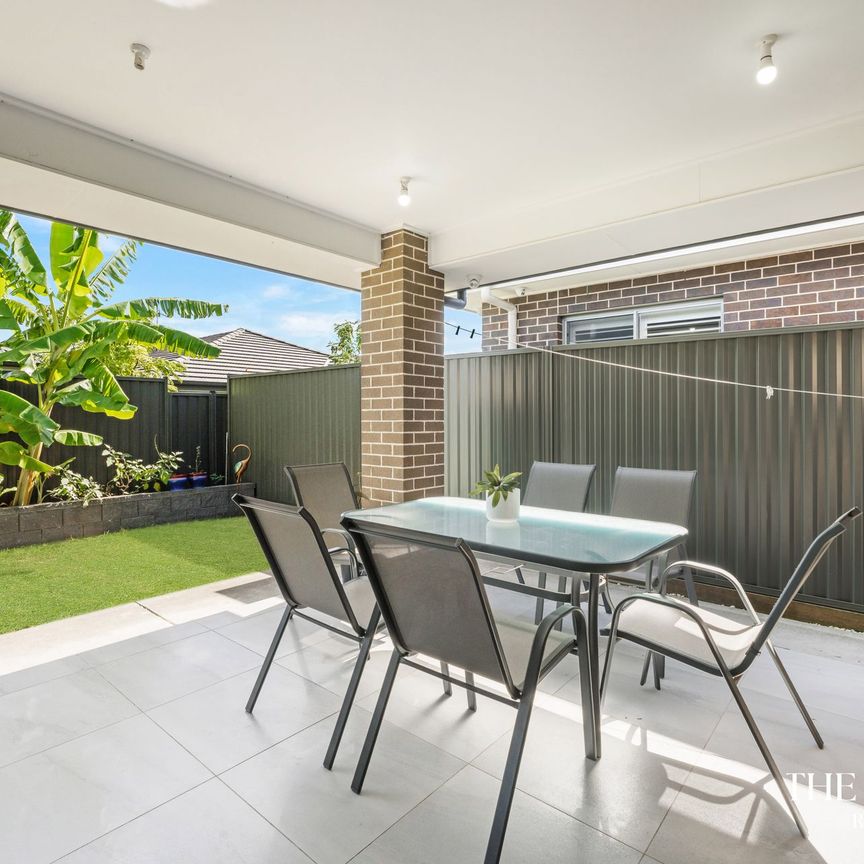 Ultra-Modern Family Home in the Heart of Marsden Park - Photo 1