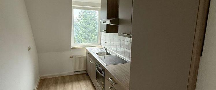 DG Maisonette 3-Zimmer mit EBK, Laminat und Wannenbad in guter Lage - Photo 1