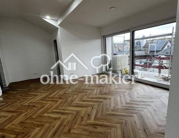 Erstbezug nach Neubau: 3 Zimmer, Balkon und zentrale Lage. - Photo 1