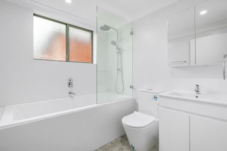 Conveniently Positioned, Completely Renovated 2 Bedroom Apartment - Photo 5