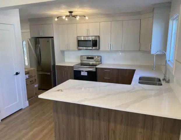 Stunning 3 Bedroom Duplex in McCauley | A - 9217 110A Ave NW, Edmonton - Photo 1