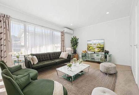 Sunny single level unit with covered deck - Photo 3