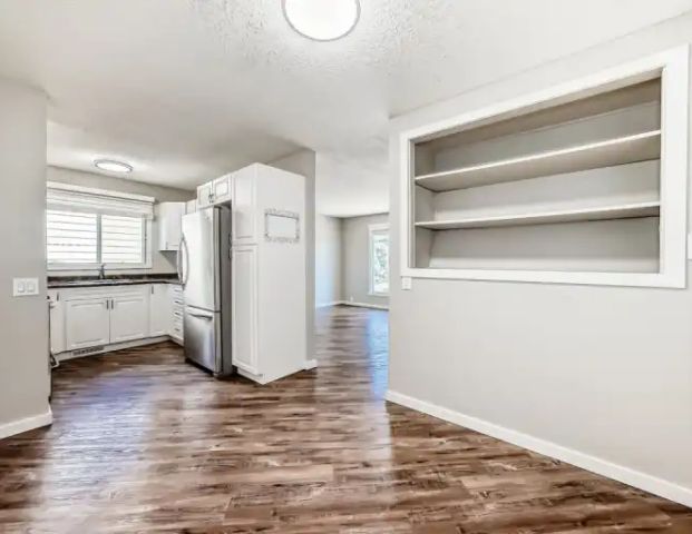 MOVE IN BONUS! Get a $300 Visa Gift Card! Modern 2 Bed + Bath Upper Suite | 7807 21A Street Southeast, Calgary - Photo 1