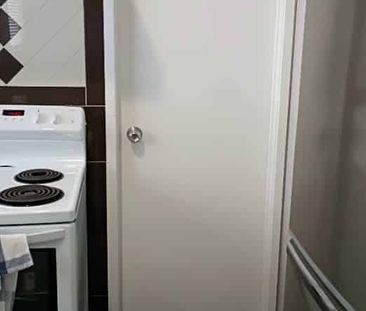 Beaufully presented two bedroom unit with a garage - Photo 3