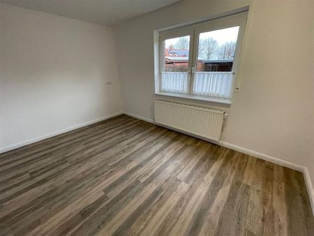 Moderne 3-Zimmer-Erdgeschoss-Wohnung mit Terrasse, Garage und Garten -- frisch renoviert, viel Comfort auf 93 m2! - Foto 3