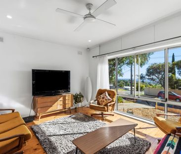 Inviting three bedroom home in elevated position with sweeping views. - Photo 1