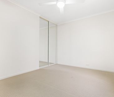 Open the door to relaxed family living with multiple living zones - Photo 3