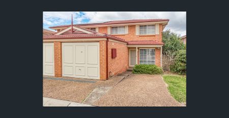 CONVENIENTLY LOCATED TOWNHOUSE - Photo 5