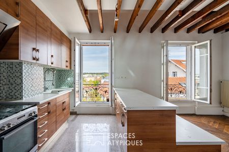 Duplex atypique en dernier étage - Photo 2