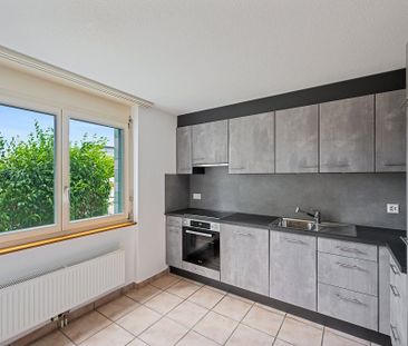 Appartement de 4 pièces au rez-de-chaussée avec balcon - Photo 2