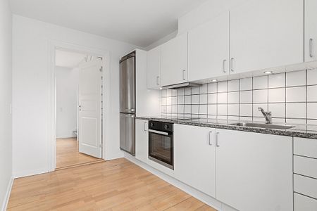 Skøn, central lejlighed i to etager - Photo 4