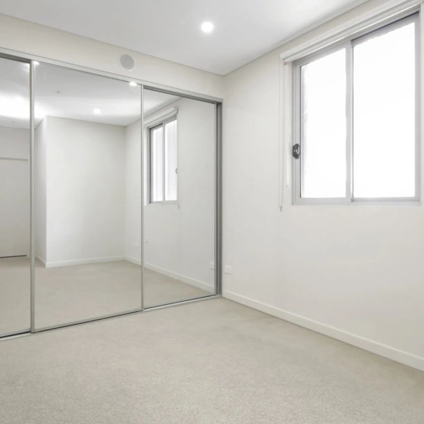 Immaculate and Convenient Two Bedroom Apartment - Photo 1