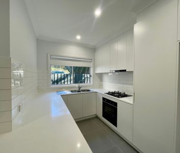 NEAR NEW SPACIOUS FOUR BEDROOM TOWNHOUSE - Photo 6