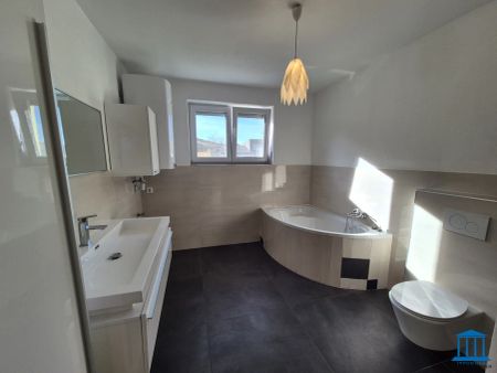 Terrassen-Wohnung im Erdgeschoss mit Einbauküche und bis zu zwei PKW-Abstellplätzen / Top 2 - Photo 5
