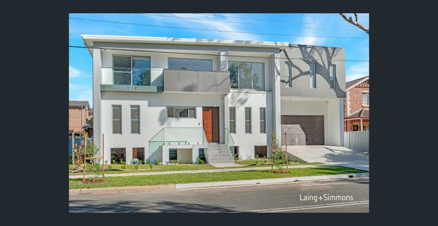 Stylish and Ultra Modern Family Home! - Photo 1