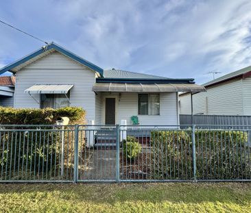 Spacious Family Home with Huge Backyard & Double Shed - Photo 1