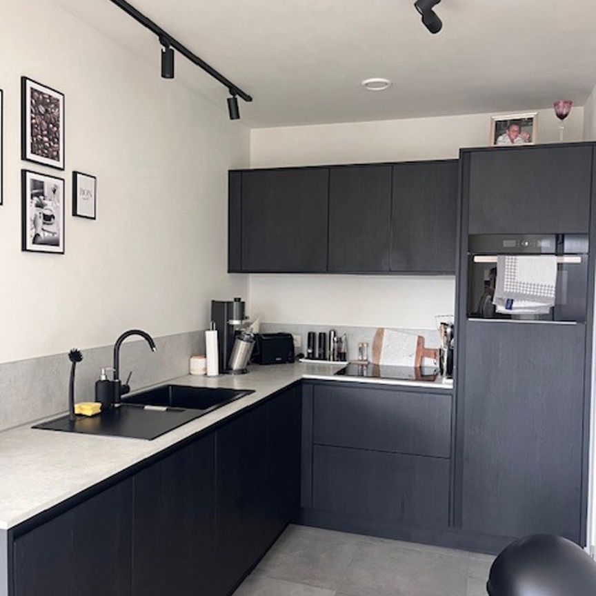 Energiezuinig nieuwbouwappartement met 2 slaapkamers en terras in Bornem - Photo 1