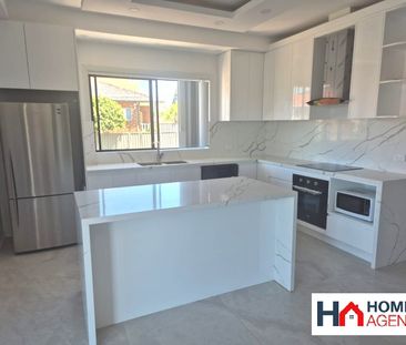 FULLY RENOVATED 4 BEDROOM HALF HOUSE (Top Level) - Photo 2