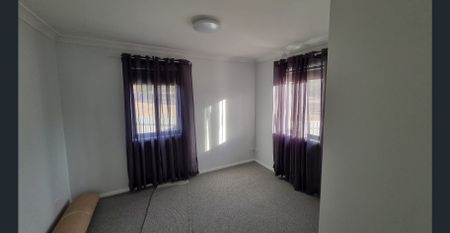 THREE BEDROOM HOME WITH FULLY ENCLOSED YARD - Photo 4