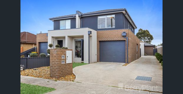 Setting the standard in low maintenance living - Photo 1