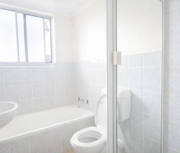 Sunlit, 2 bedroom residence with a lock up garage - Photo 3