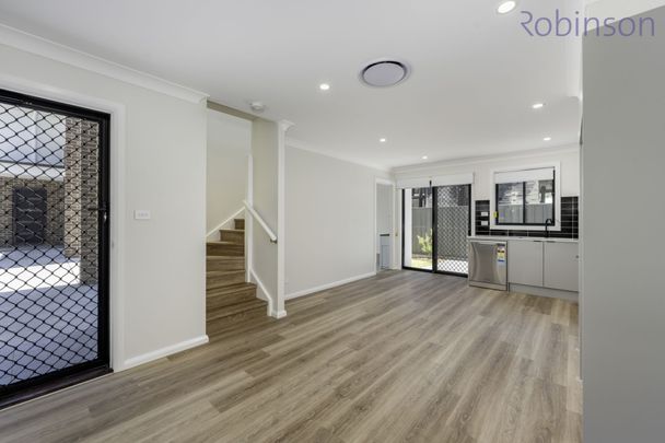 Brand new three bedroom townhouse with ducted air conditioning - Photo 1