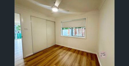 Modern Two-Bedroom Retreat in Weston - Photo 3