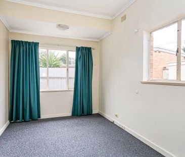 Four Bedroom Home in Popular Location - Photo 5