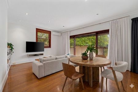 Character Filled Home with Spacious interiors & Off Street Parking! - Photo 2