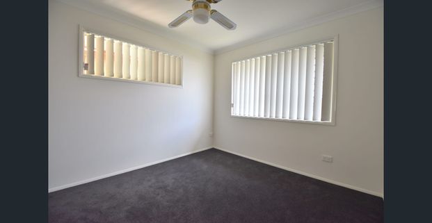 Spacious 4 Bedroom Family Home with Side Access!! - Photo 1