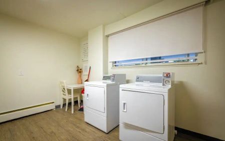 Hollyhill Towers — 2 Bedroom available at 1665 Duchess Ave, West Vancouver - Photo 2