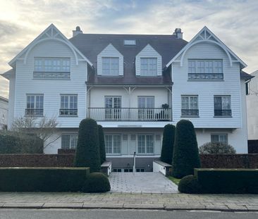 GELIJKVLOERS APPARTEMENT MET OVERDEKT TERRAS EN TUIN - Photo 2