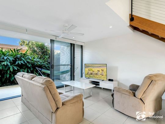 Modern living close to shops & beaches - Photo 1
