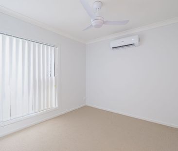 Stylish New 4-Bedroom Home in Royal Pines Estate - Photo 1