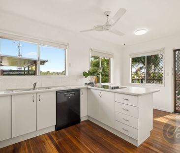 Brick Family Home with Balcony Charm & Pool - Photo 6