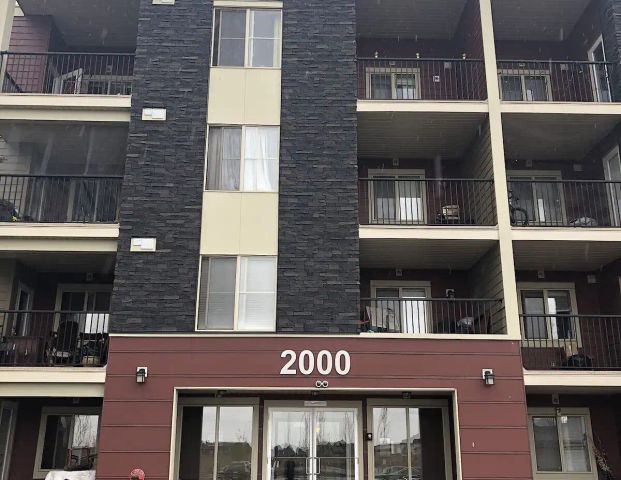 1Bed/1Bath + Den Unit in Saddleridge — 1 Bedroom+ Den Condo Unit - Photo 1
