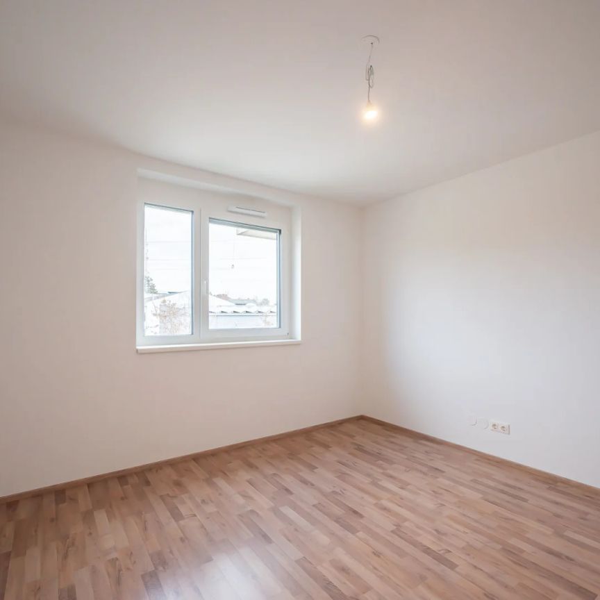 2 Zimmer Erstbezguswohnung mit perfektem Grundriss, Balkon, KFZ-Stellplätzen - jetzt zu mieten, später zu kaufen! - Photo 1
