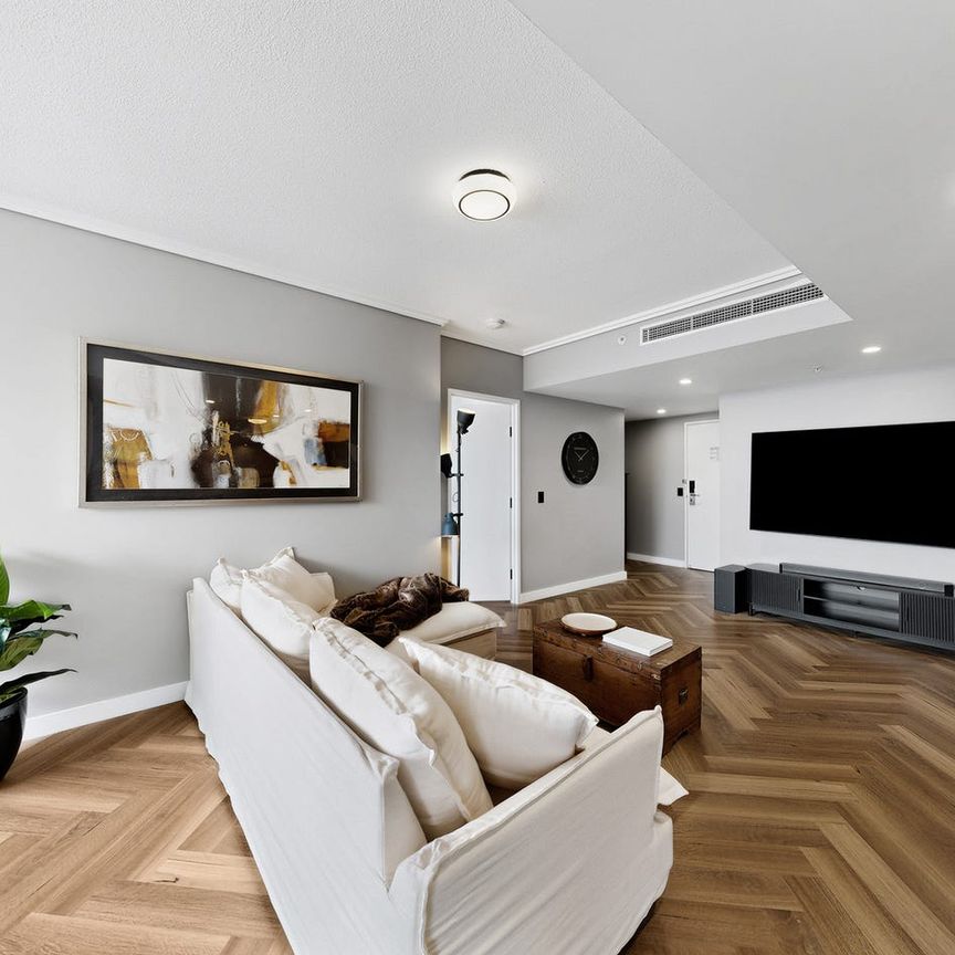 A Statement in Style | Exquisitely Renovated CBD Apartment with Spectacular Views - Photo 1