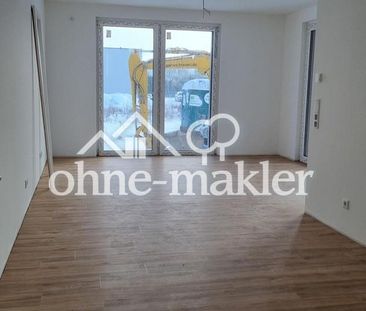 Erstbezug in Voxtrup: Exklusive 2ZKB EG-Wohnung mit Terrasse + Stel... - Photo 1
