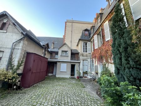 A LOUER - Quartier Palais Jacques Cœur - Appartement de standing de 117m² avec garage et dépendances. - Photo 4