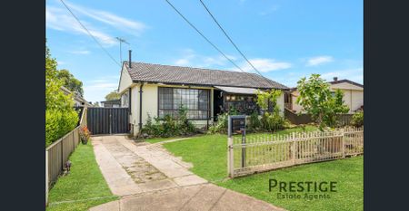 Neat & Spacious Family Home in a Convenient Mount Pritchard Location - Photo 4