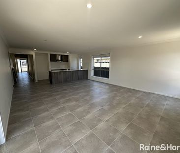 Modern Family Living in the Heart of Munno Para Downs - Photo 3