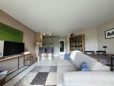 Lichtrijk appartement met garage box - Photo 4